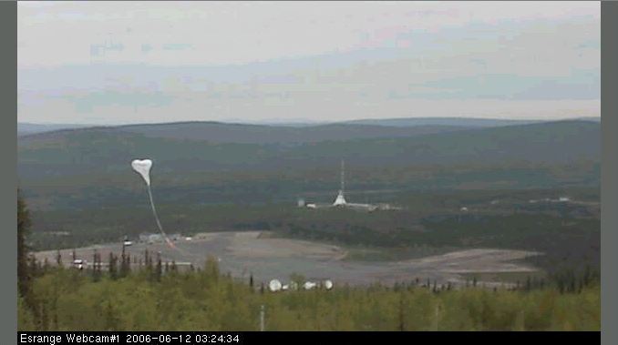 Image of the release of the balloon wich is acquiring the typical cobra head shape. The image was obtained with the ESRANGE's webcam mounted in a nearby hill near the launch pad.