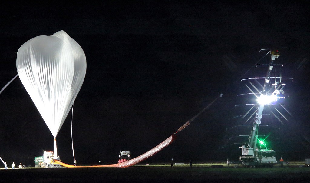 Still in darkness, SMILE balloon being inflated (Image: ISAS/JAXA)